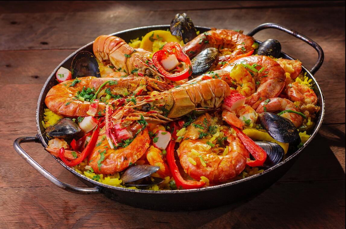 free-photo-of-seafood-paella-with-lobster