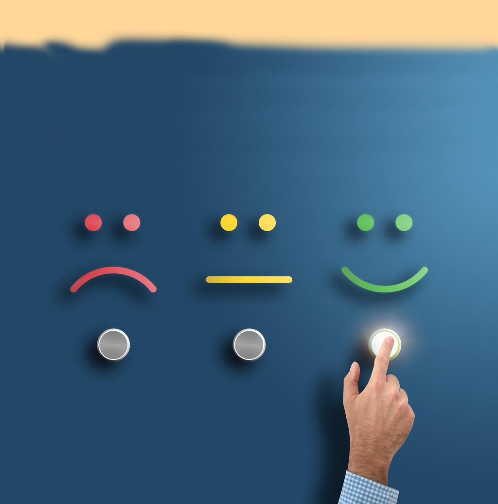 service rating and survey concept with hand touching interface button with smiling face