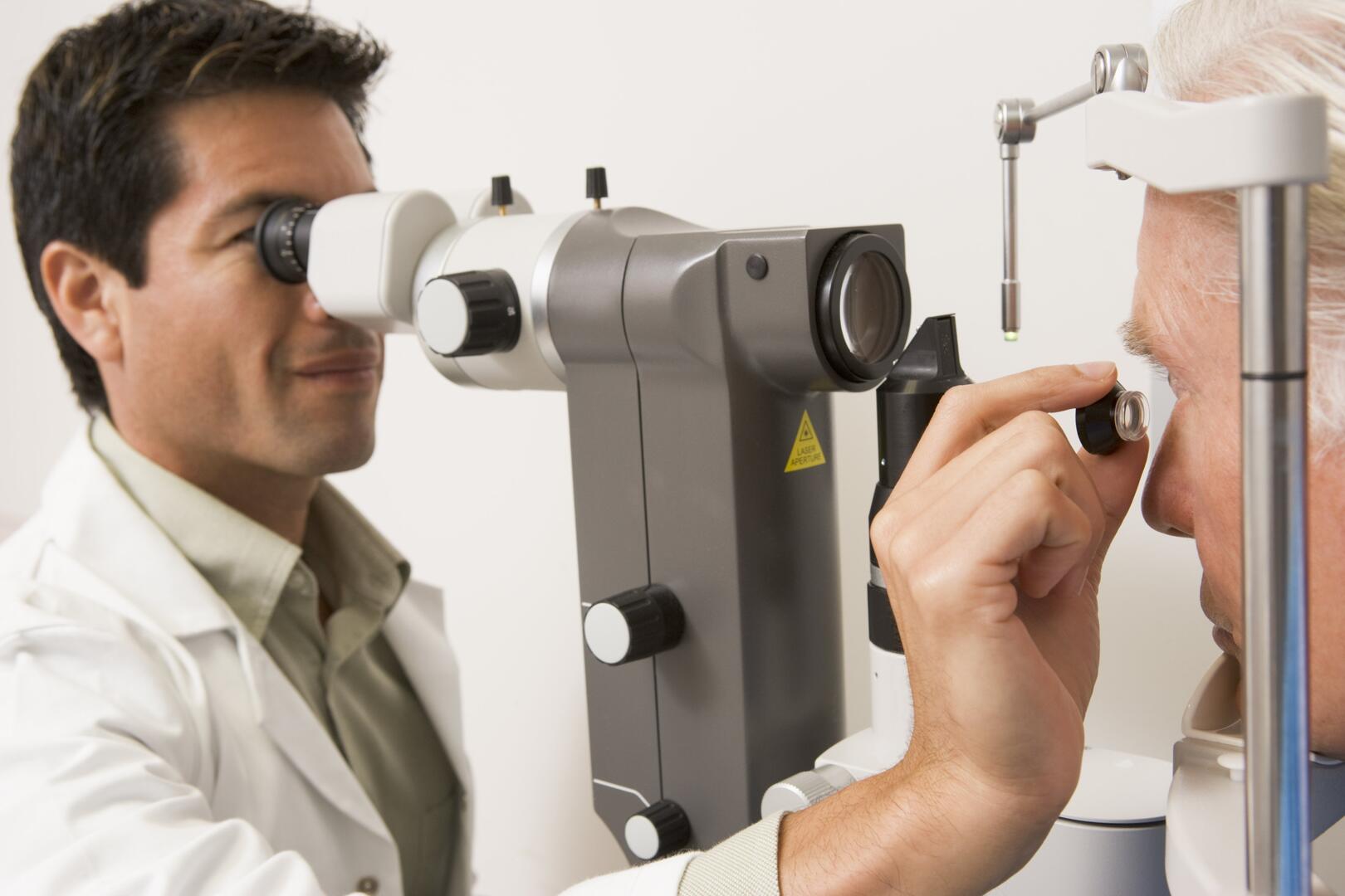 Doctor Checking Patient's Eyes