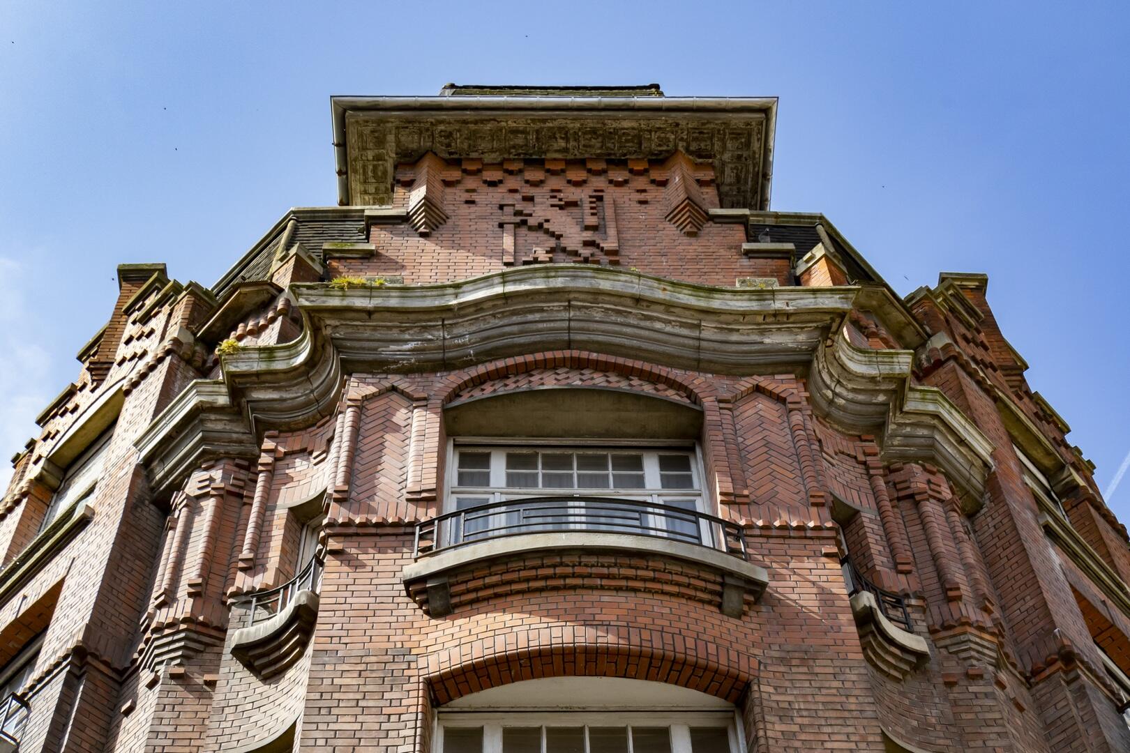 Façade Homme de fer-art-déco-Douai-Douaisis-Nord-France (c) AD Langlet
