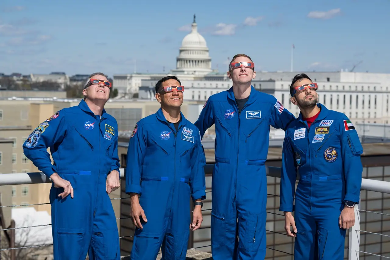 Expedition 69 Crew Wears Solar Eclipse Glasses