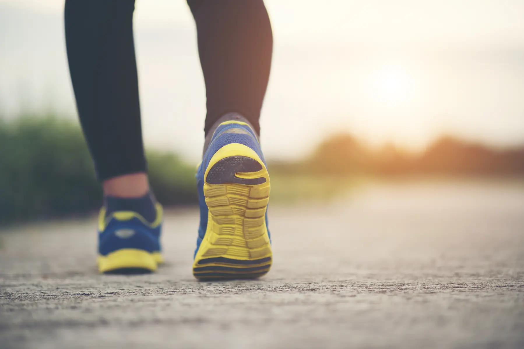 Close up on running shoes Fitness women training and jogging