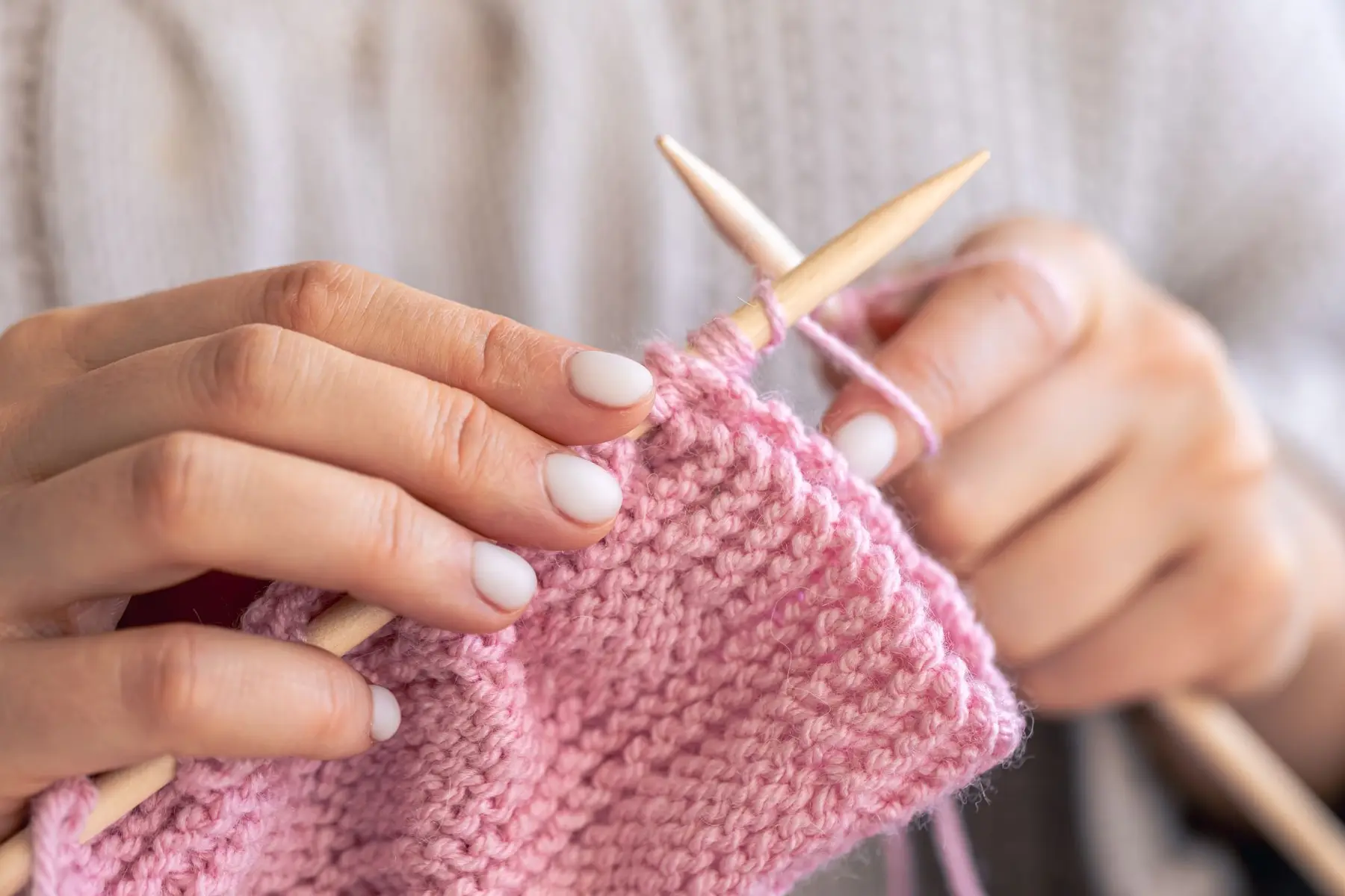 closeup-hands-knitting-using-circular-needles