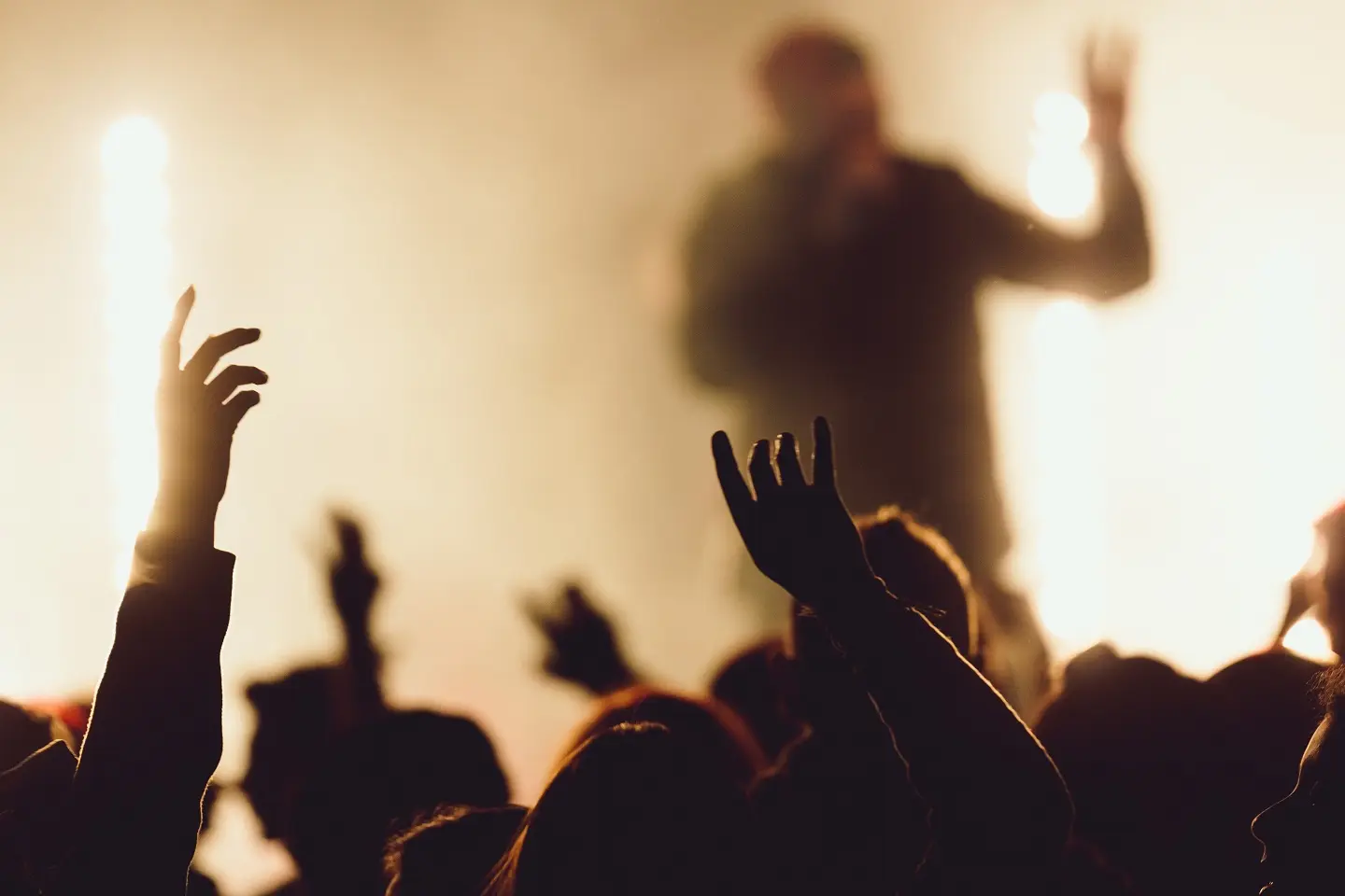 dancing-concert-while-singer-is-performing-surrounded-with-lights