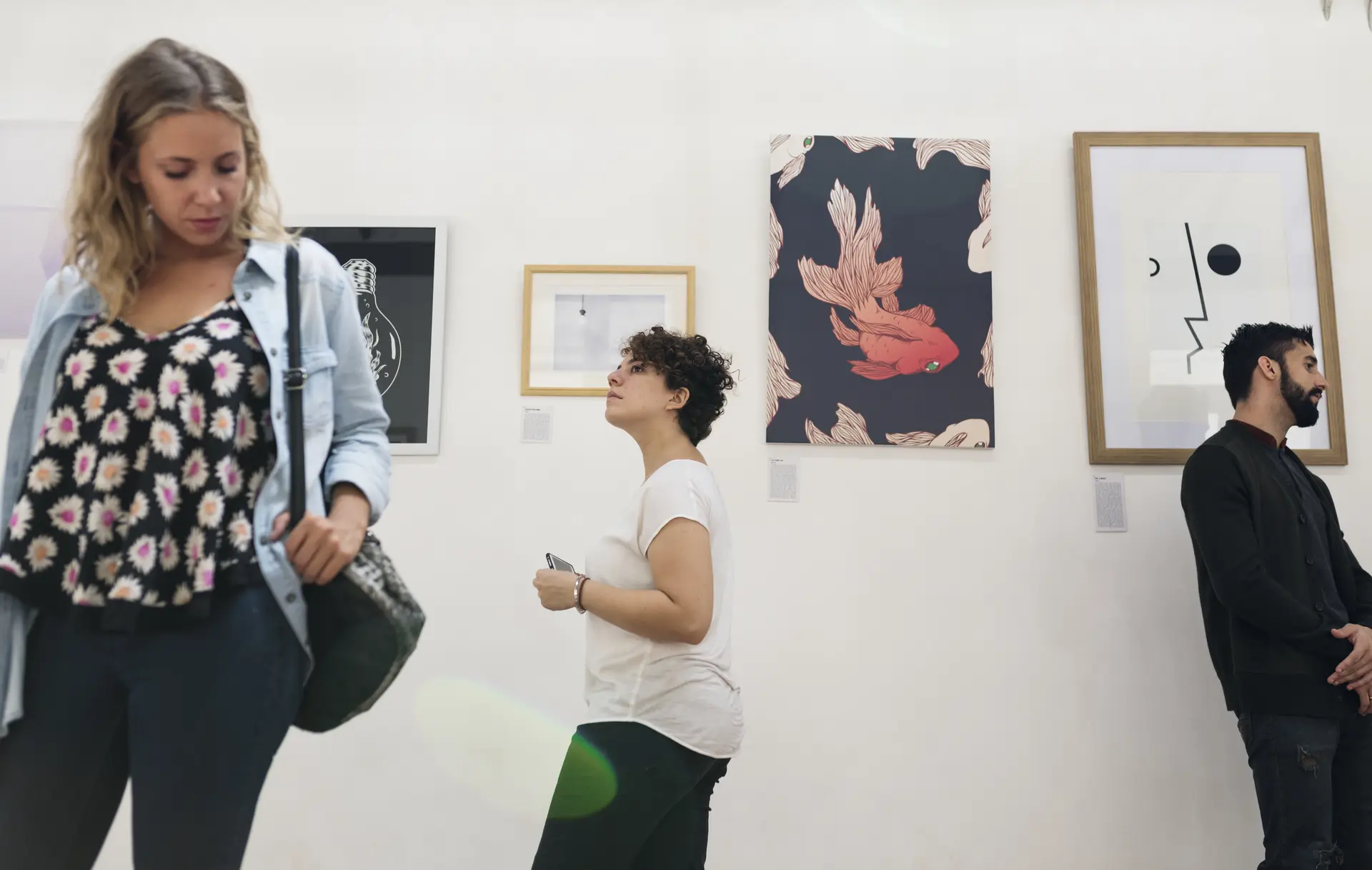 People attending an art exhibition