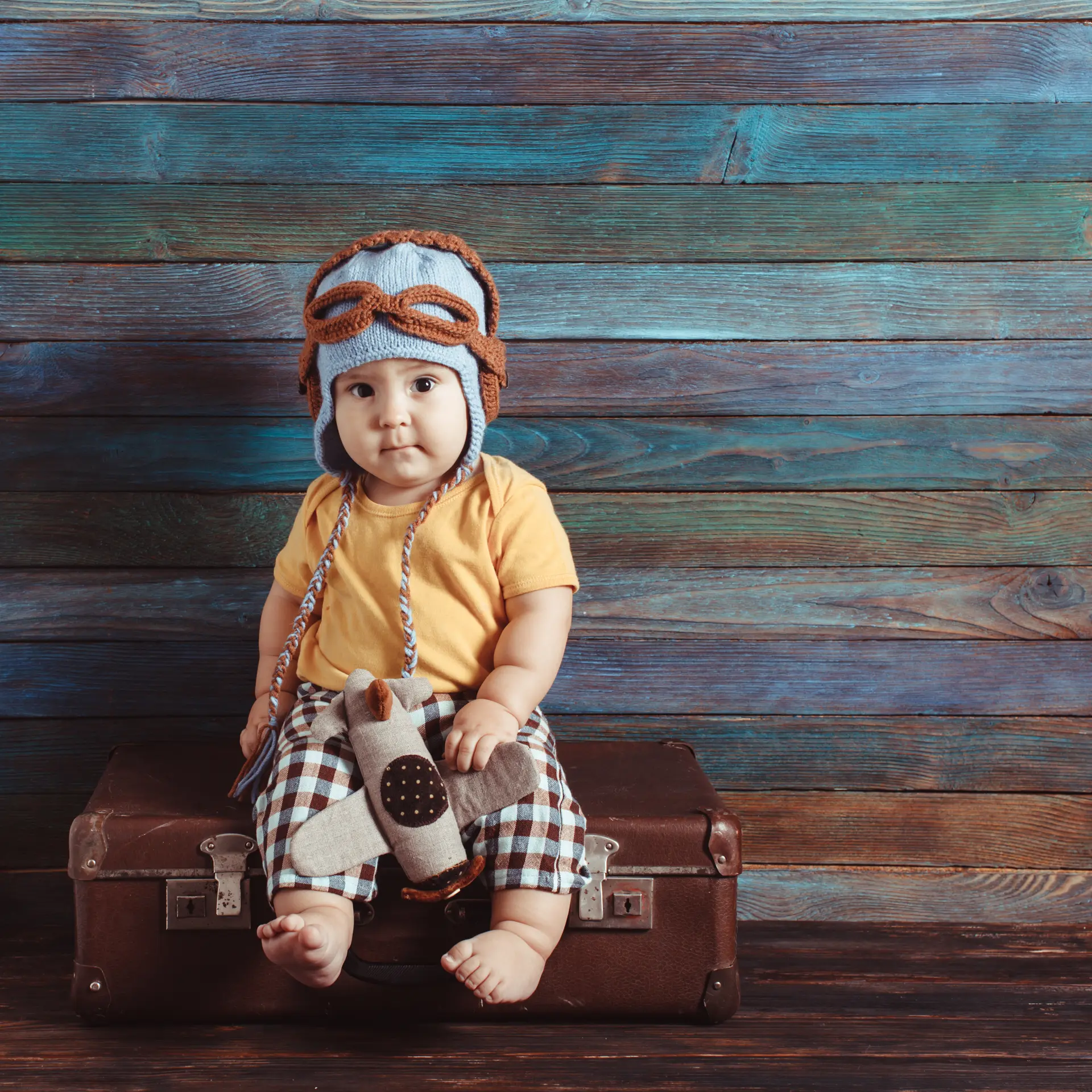 Little boy with a toy airplane