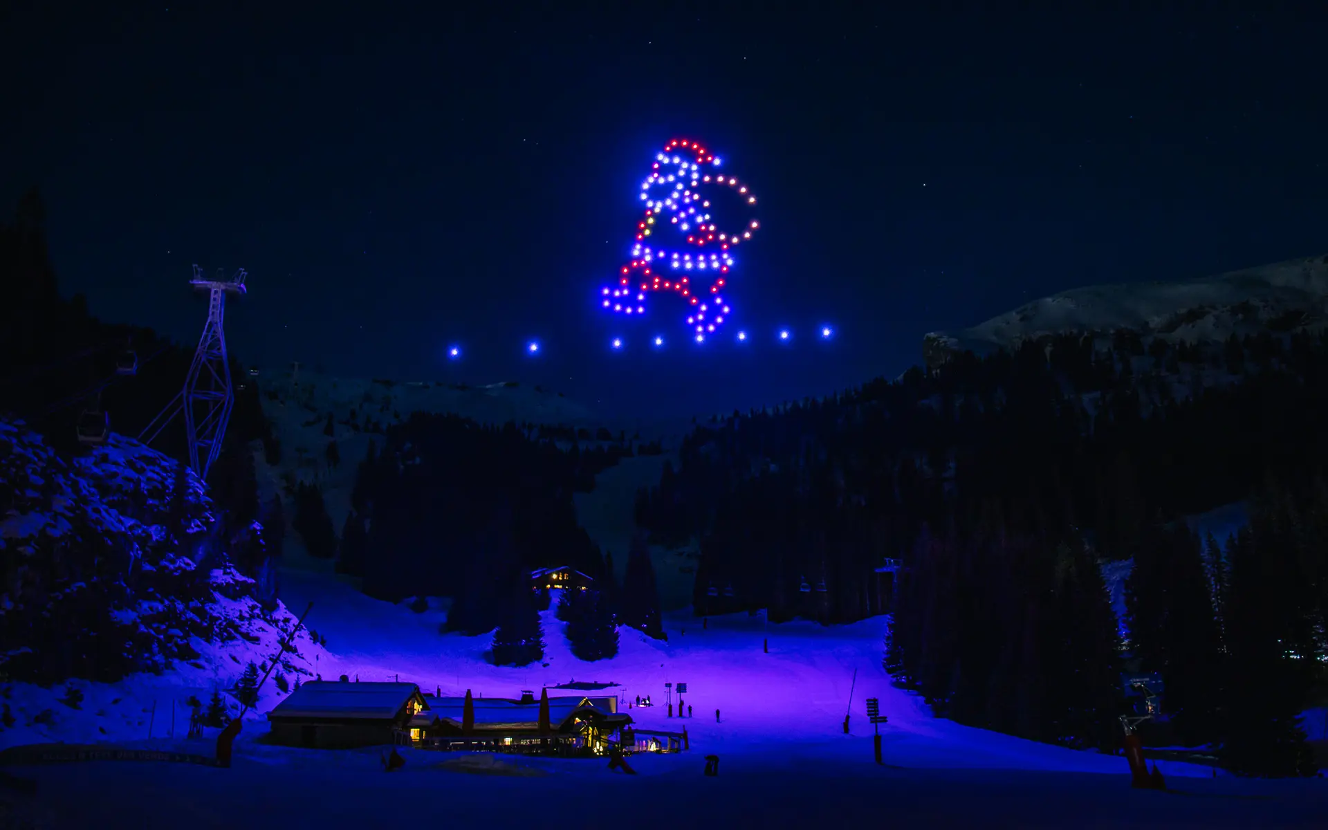 Spectacle de drone sur le thème de Noël et des vacances au ski