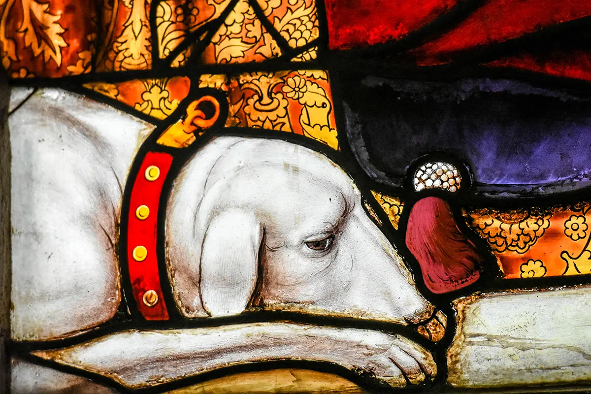 Vitrail du monastère royal de Brou représentant un chien