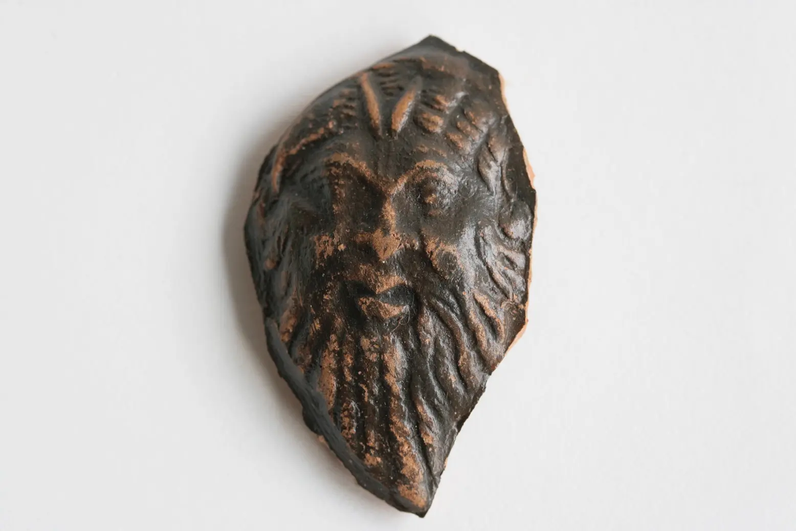 Relief d'applique : masque de Pan, IIe ou IIIe siècle ap. J.-C. Collection Musée départemental de la Céramique