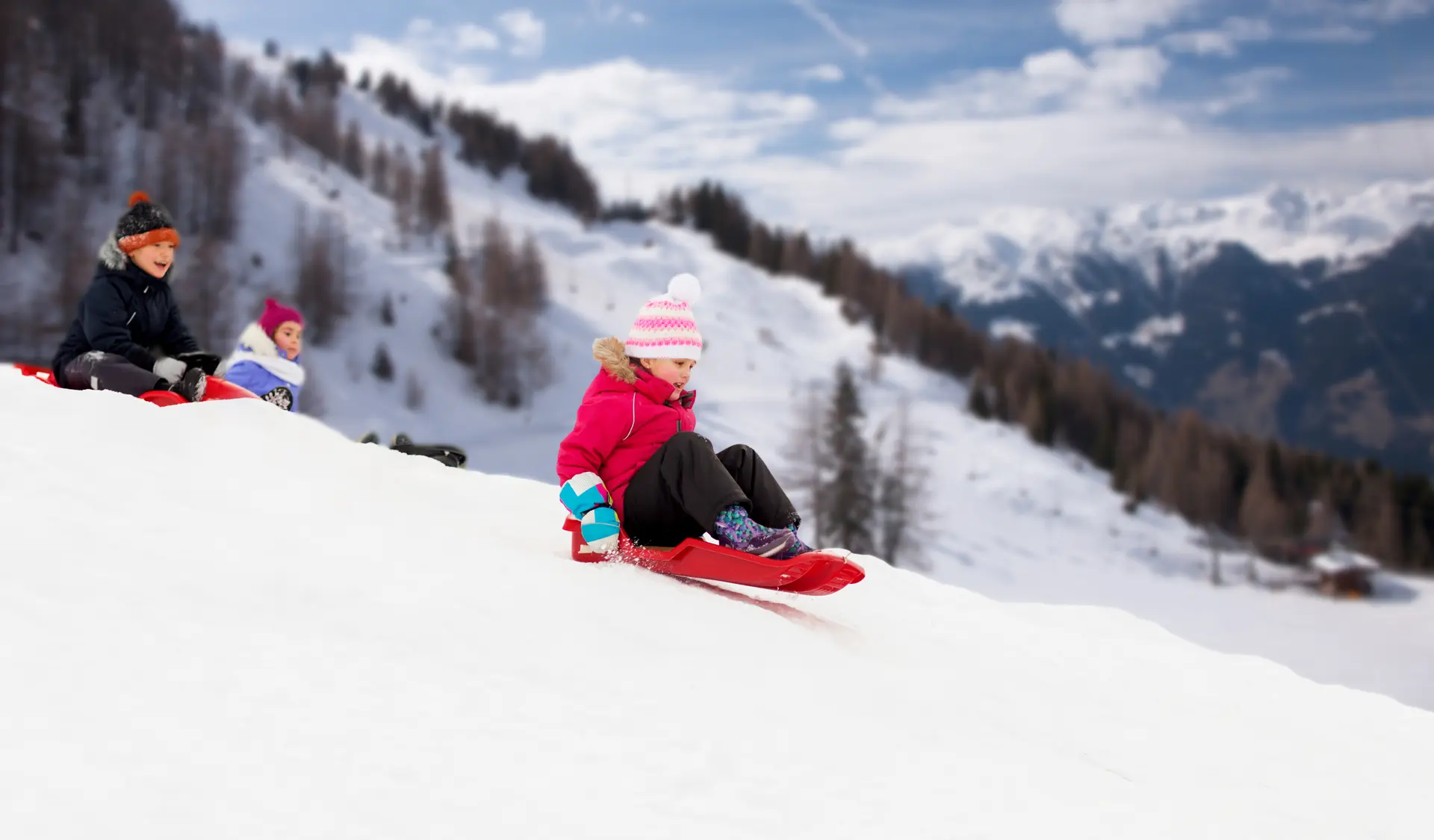 luge enfants neige montagne
