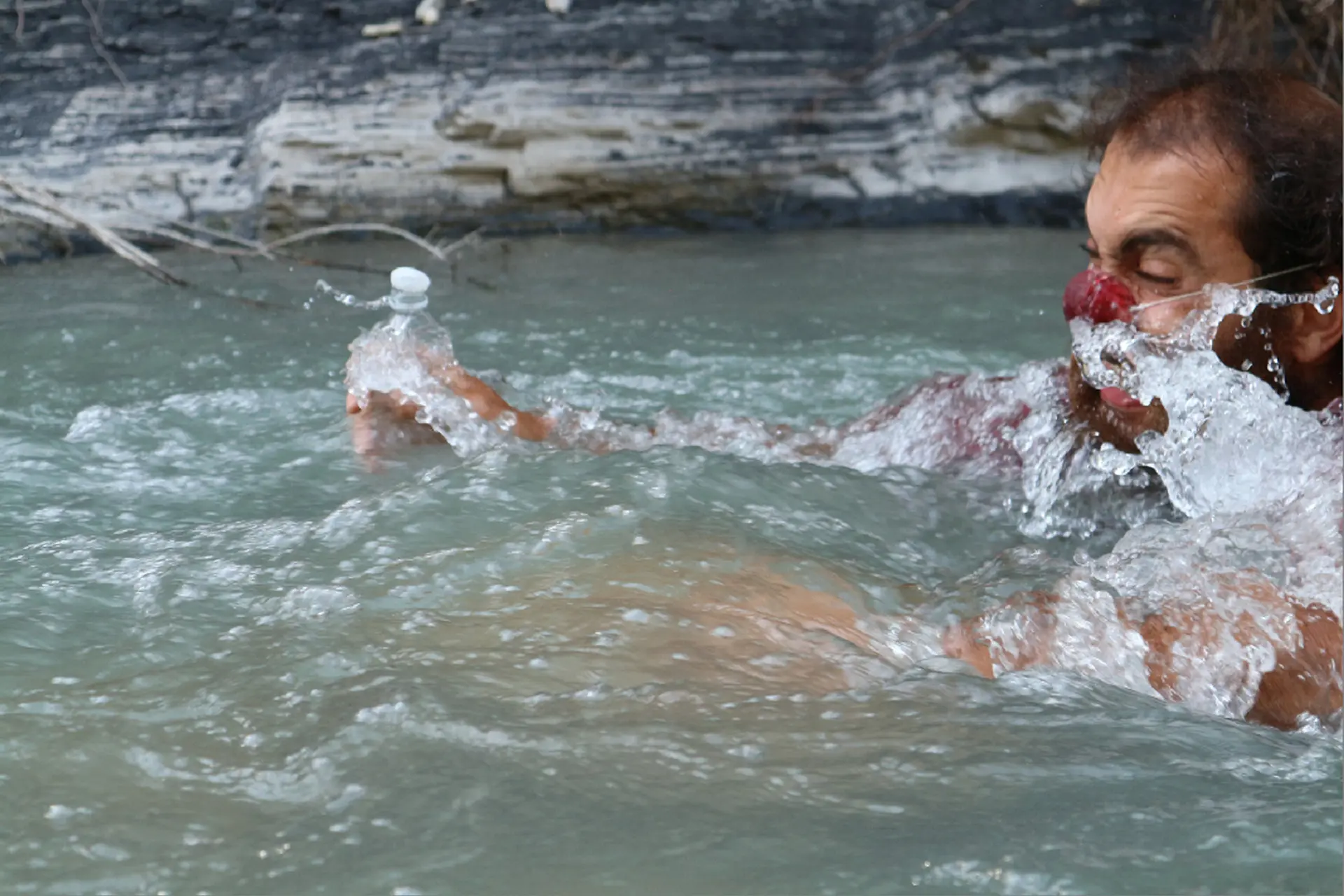 Le clown Caf' et sa bouteille d'eau