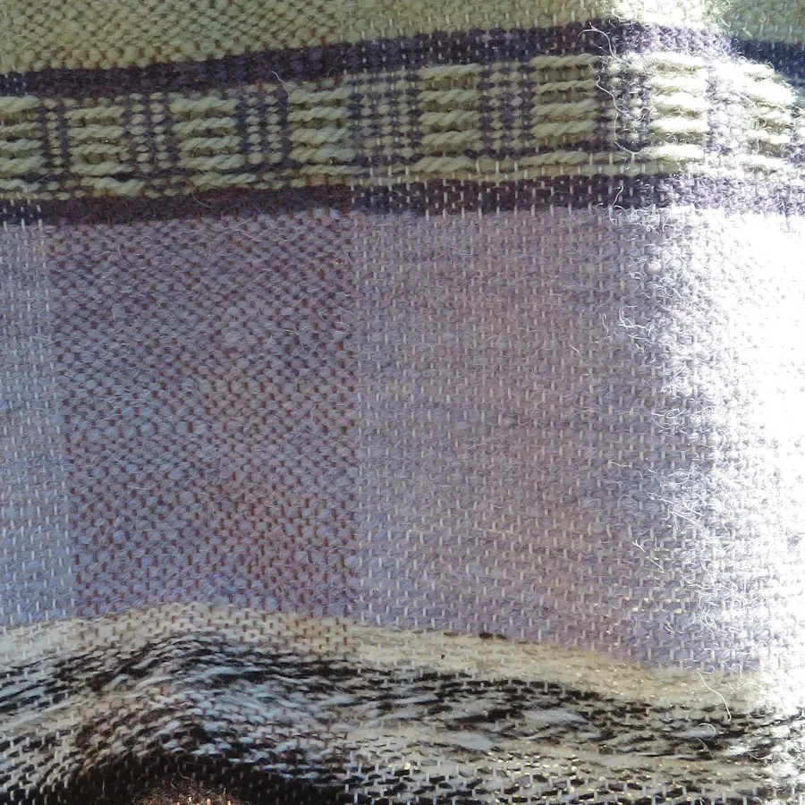 Tissage avec peigne envergeur