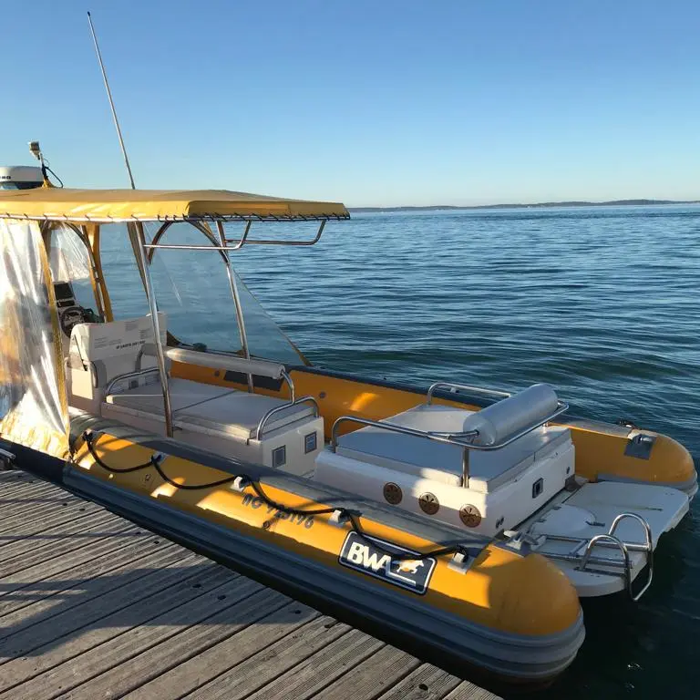 Bat'express - Bateau-taxi semi rigide jaune - Jetée