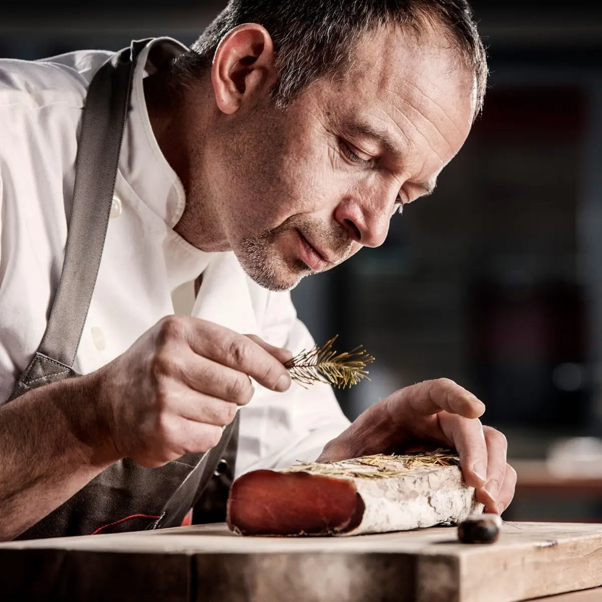 Christian Favre making cured meat