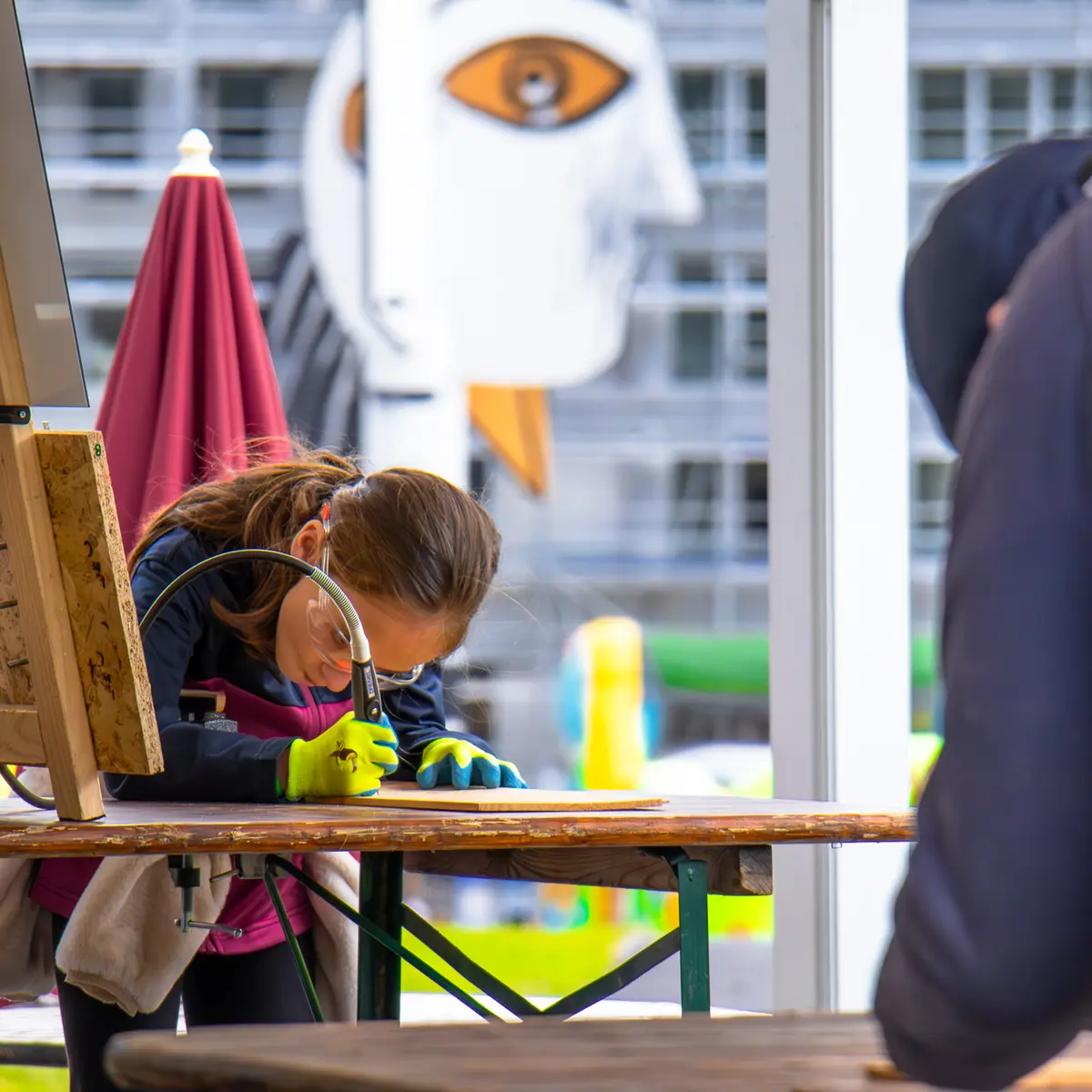 Child making an engraving