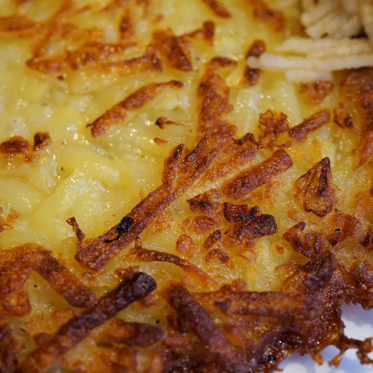 Prendre le temps de déguster une rappée de pommes de terre faite maison