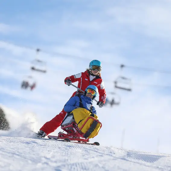 Rolstoelafdalingen op de baan