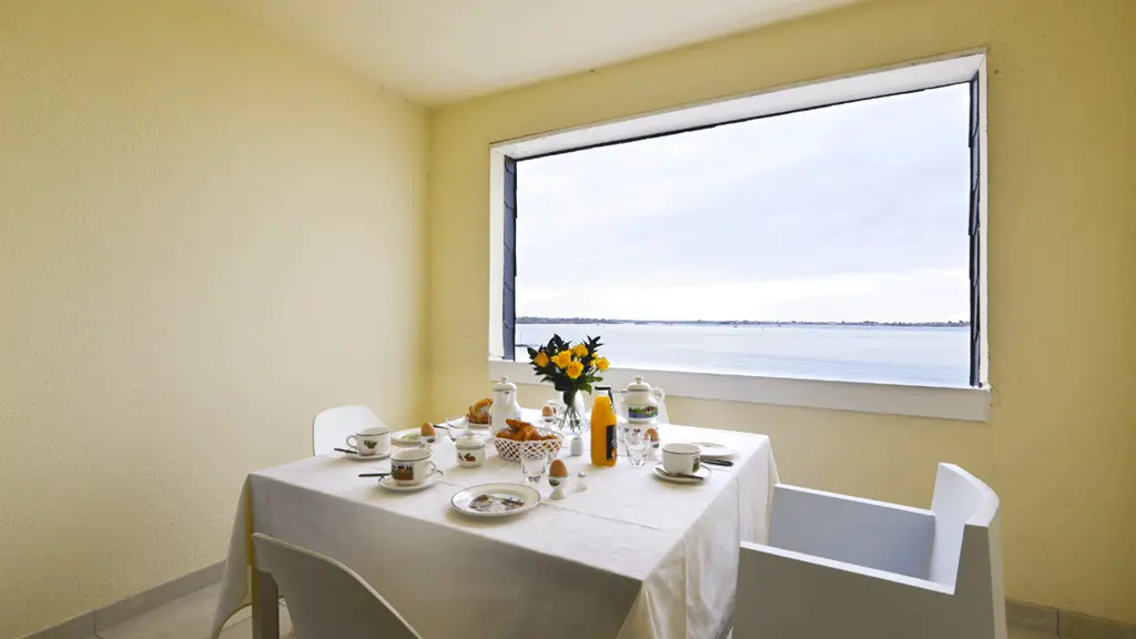 Clévacances - Meublé 56MS1249 - Appartement spacieux avec vue imprenable sur mer - Larmor-Plage - Morbihan Bretagne Sud