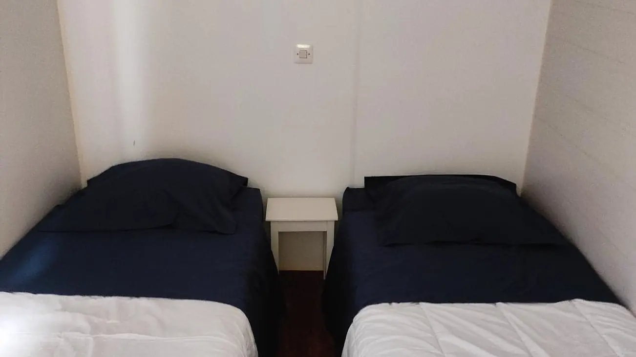 Chambre 2 lits 1 personne