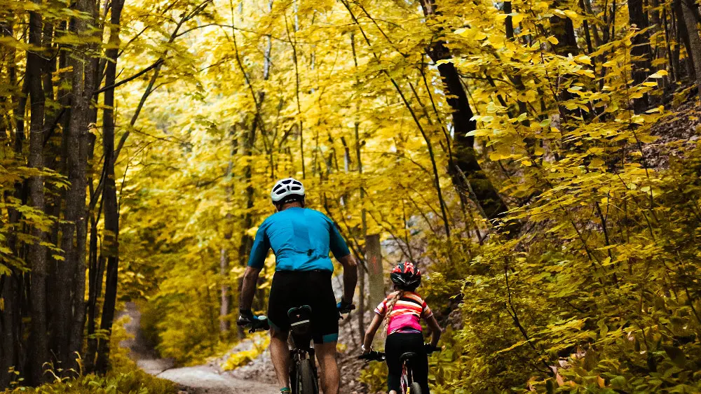 father-daughter-bike-ride-warm-early-autumn-weekend