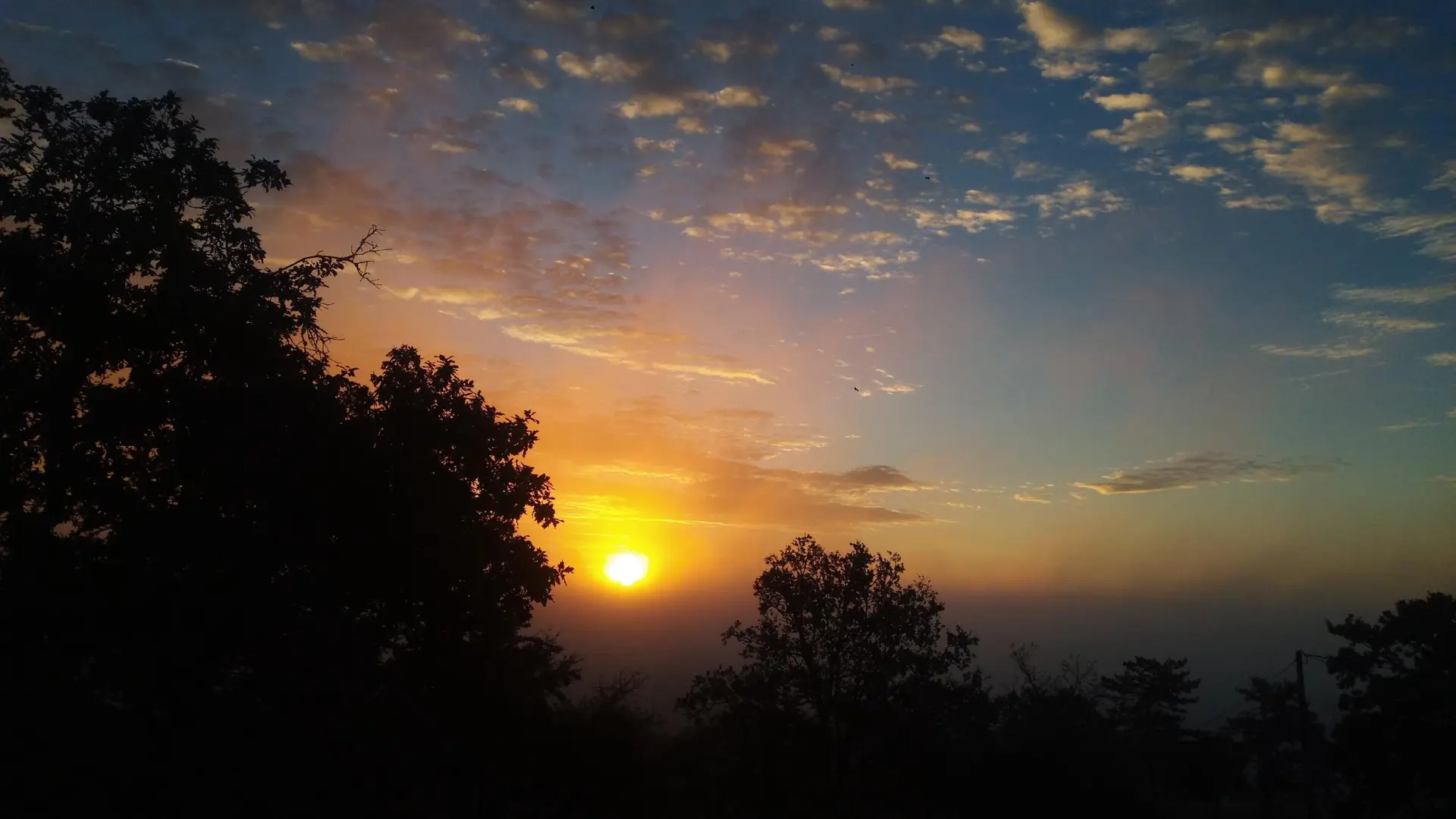 Coucher de soleil de la maison