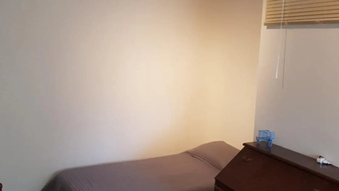 Chambre avec deux lits simples