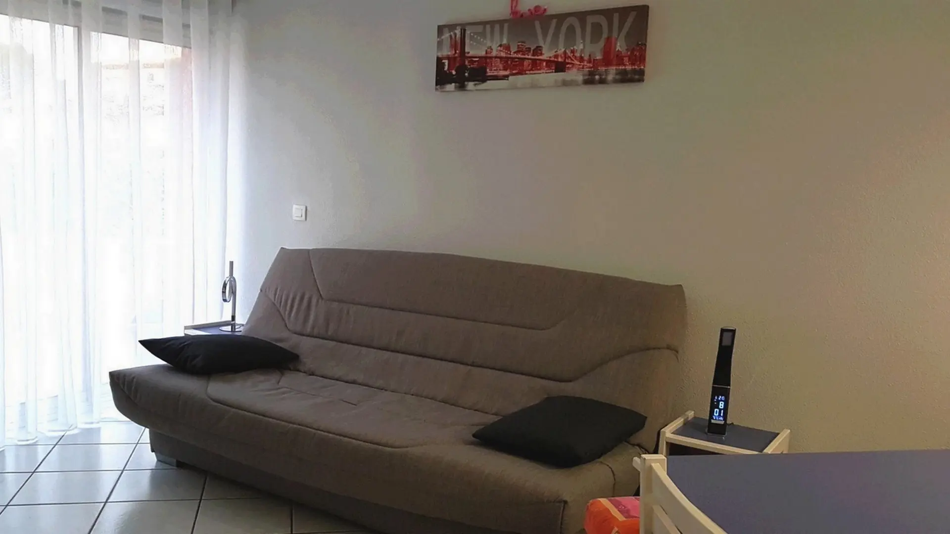 Sqéjour avec canapé convertible