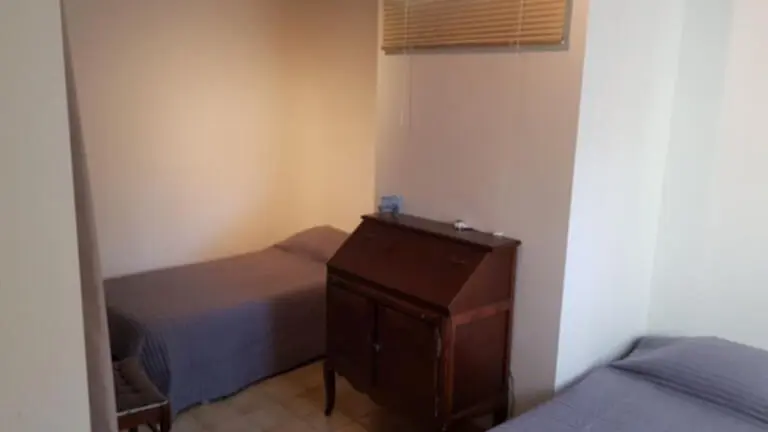 Chambre avec deux lits simples