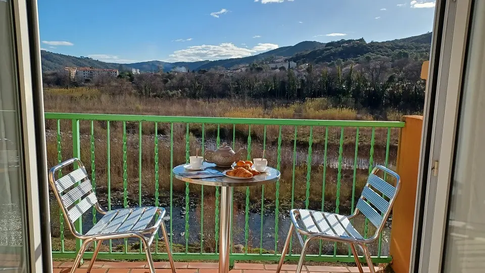 VUE BALCON RIVIERE HIVER