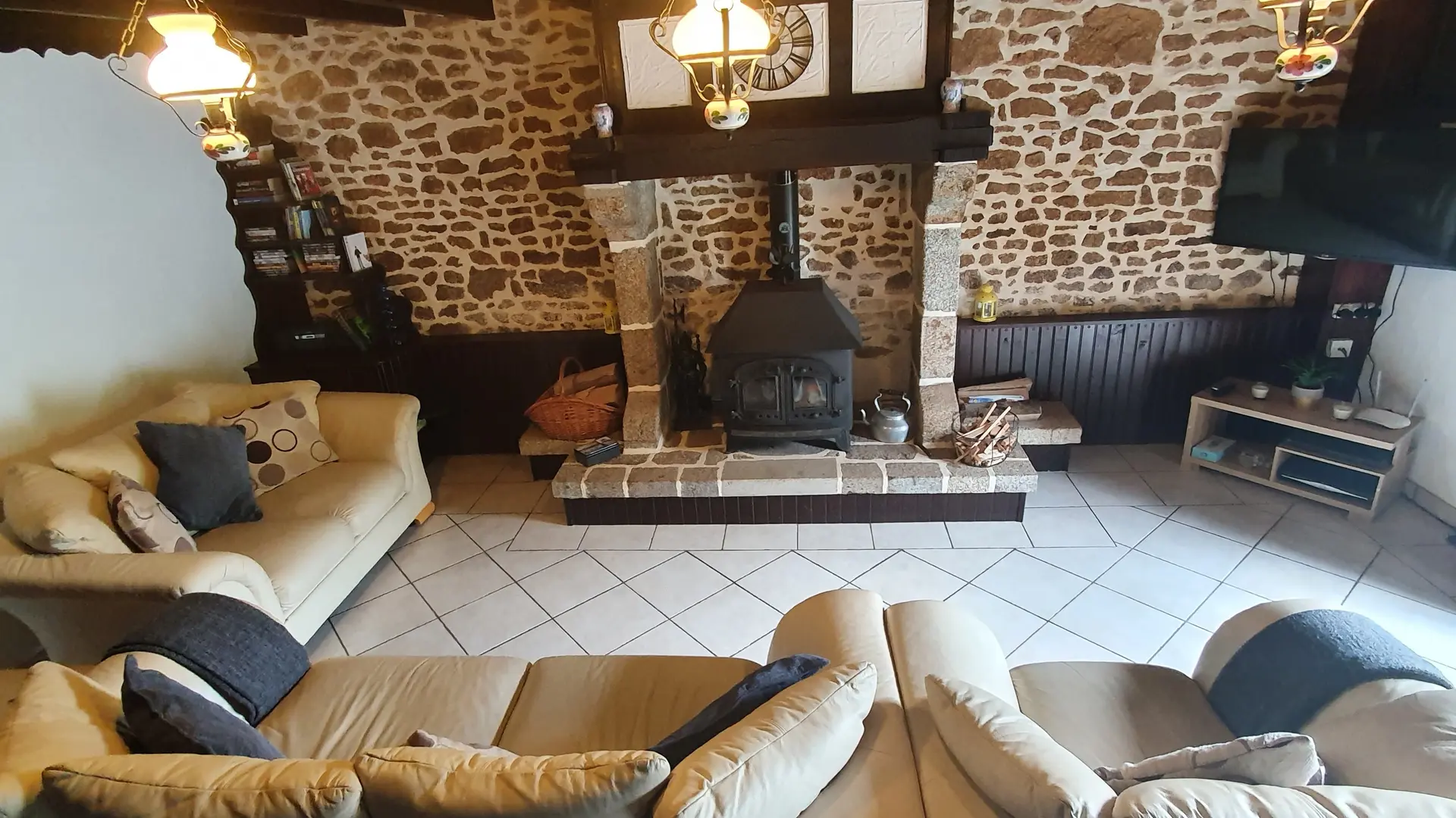 Living room with dining, large fire place with log burner