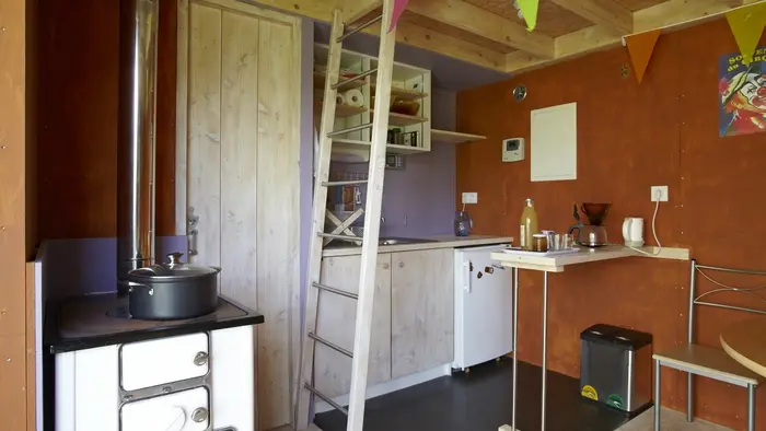 espace cuisine + chauffage bois