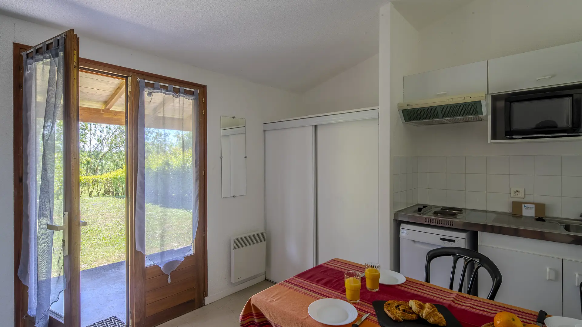 Coin cuisine accès extérieur