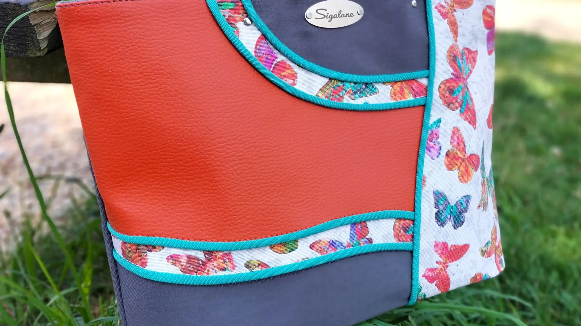 sigalane sac Jessi papillons, orange et gris