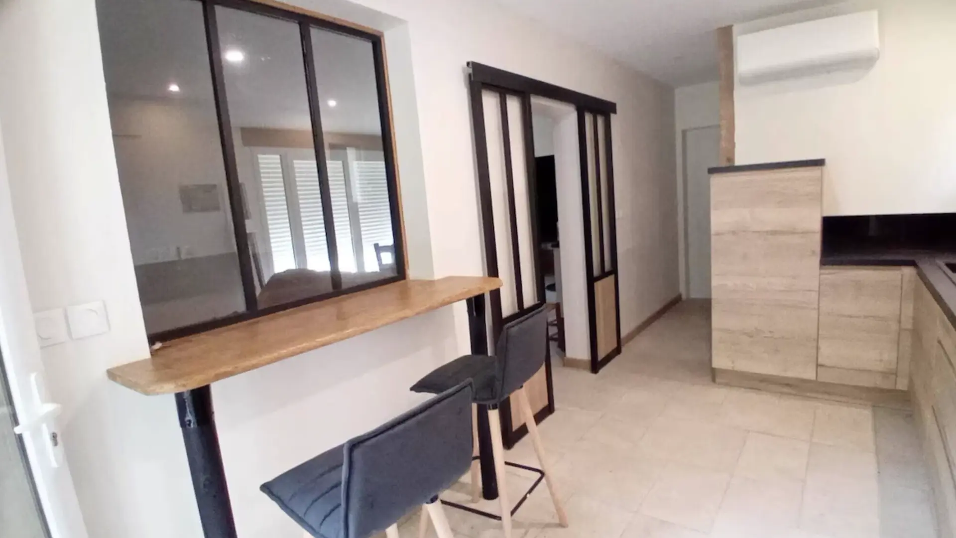 Cuisine vue salon Le Jardin d'André ©Lerre