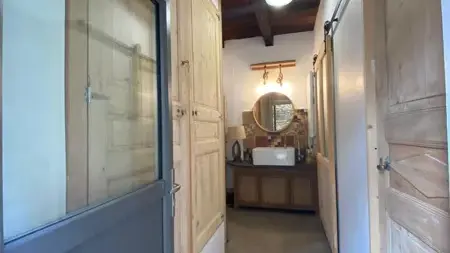 ARRIERE CUISINE AVEC BUANDERIE,WC ET DOUCHE