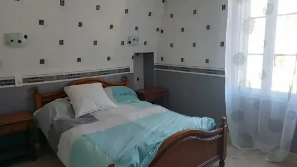 Chambre 12m² lit 140