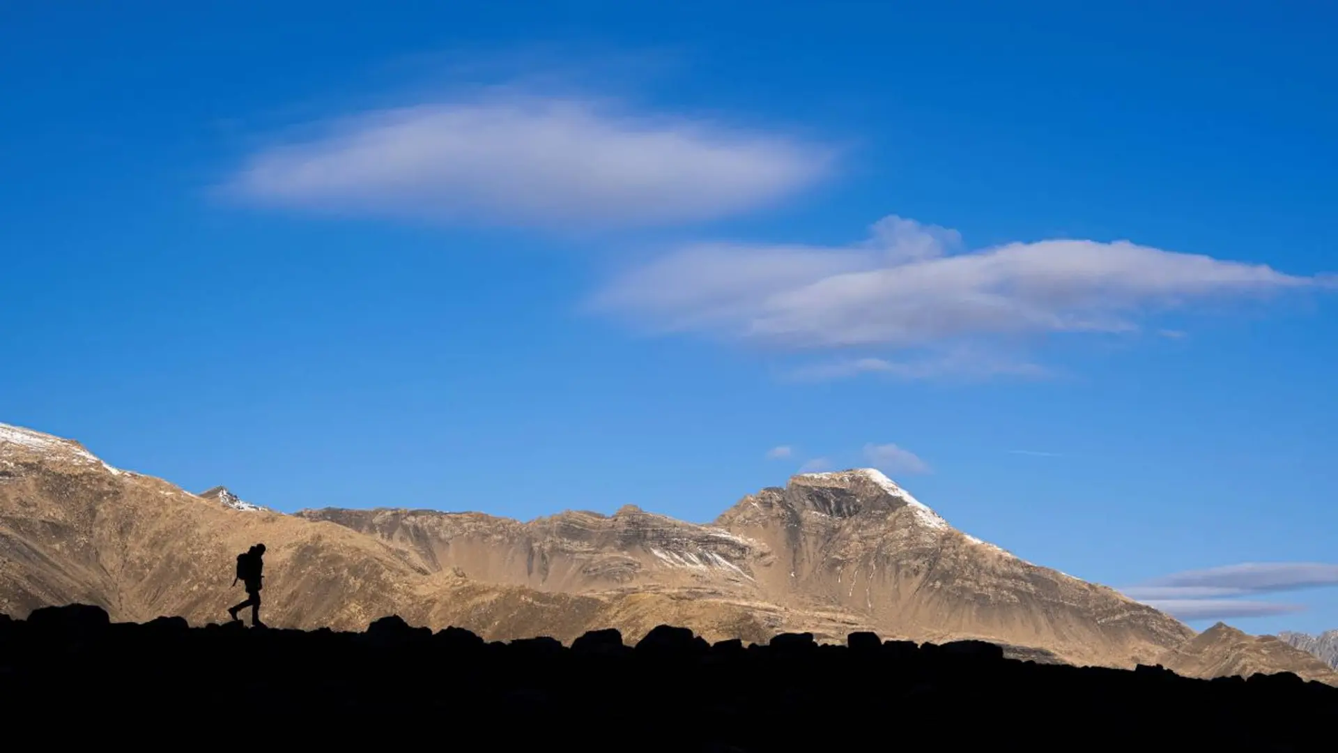 Randonneur vers le col des Terres Blanches