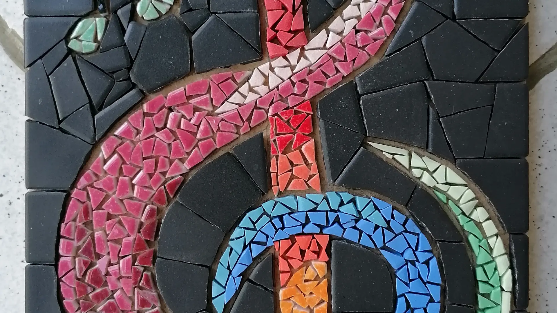 Note de musique en mosaïque coloré et noir