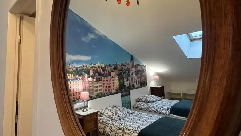 Chambre Lyon avec 4 lits simples
