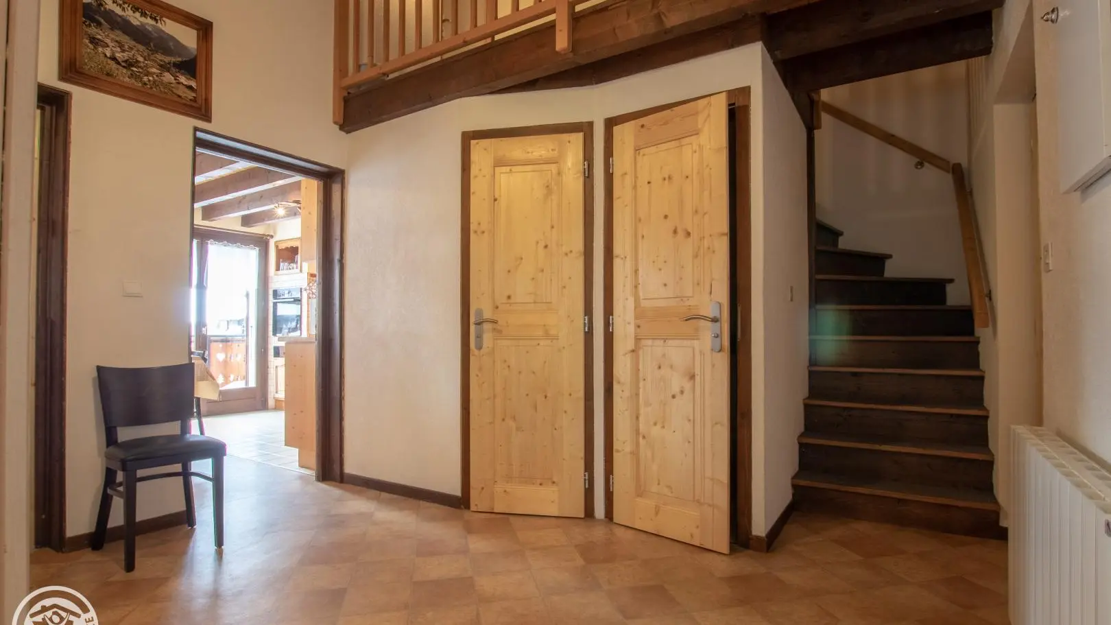 Accès au niveau supérieur depuis l'entrée.