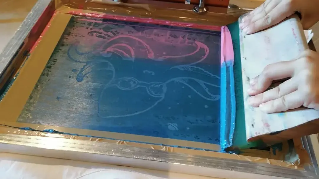 Passage d'encre à la racle