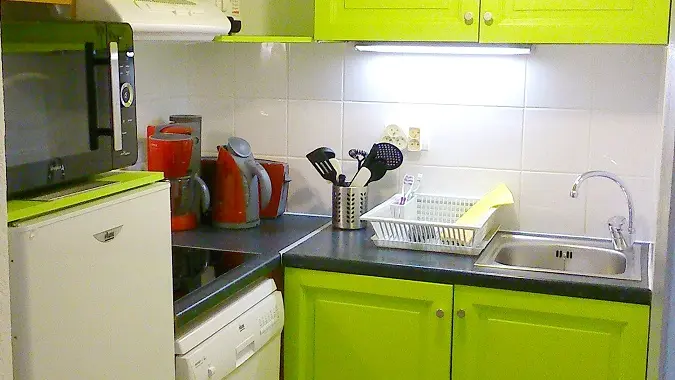 Modern kitchen with hotplates and dishwasher