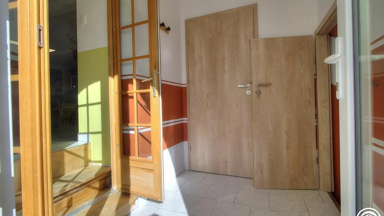 hall commun pour accéder à la salle de jeux et au Sauna