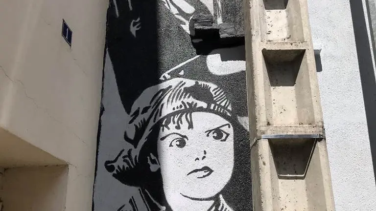 Charlie Chaplin et le kid Street Art Montauban