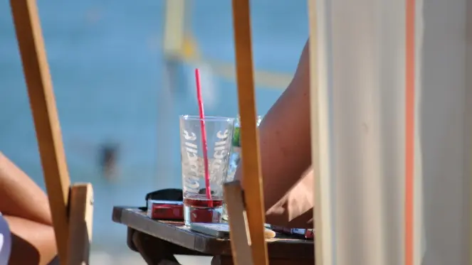 A cold drink overlooking the ocean