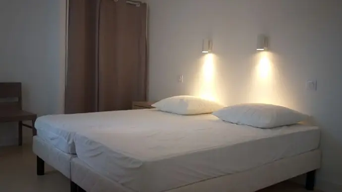 Lits pouvant être rapprochés