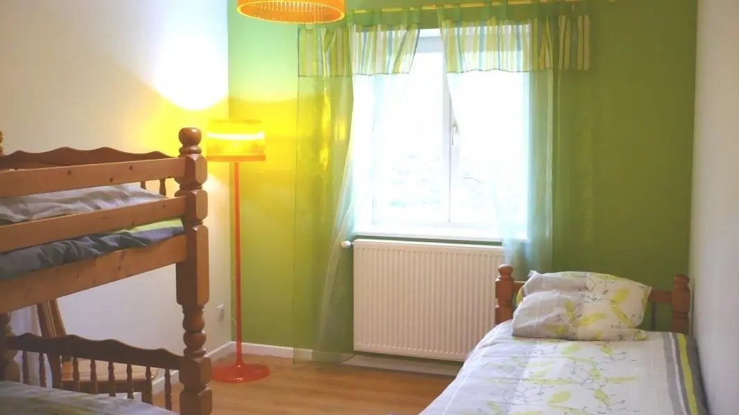 Chambre tonique : trois lits simples