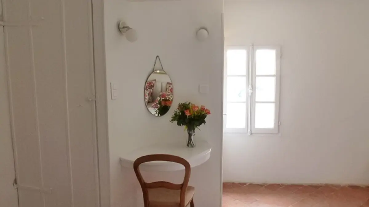 bedroom and the door that goes to the living room