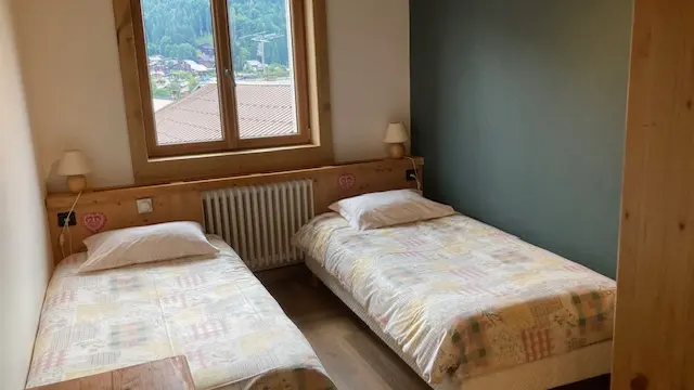 Chambre avec 2 lits 1 place