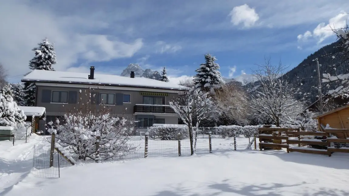 Appartement Le Clos du Moulin à Bernex - Vue extérieure sous la neige